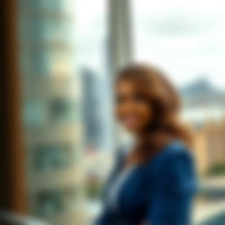 Portrait of Stacey Burke in a professional setting with South African landmarks in the background