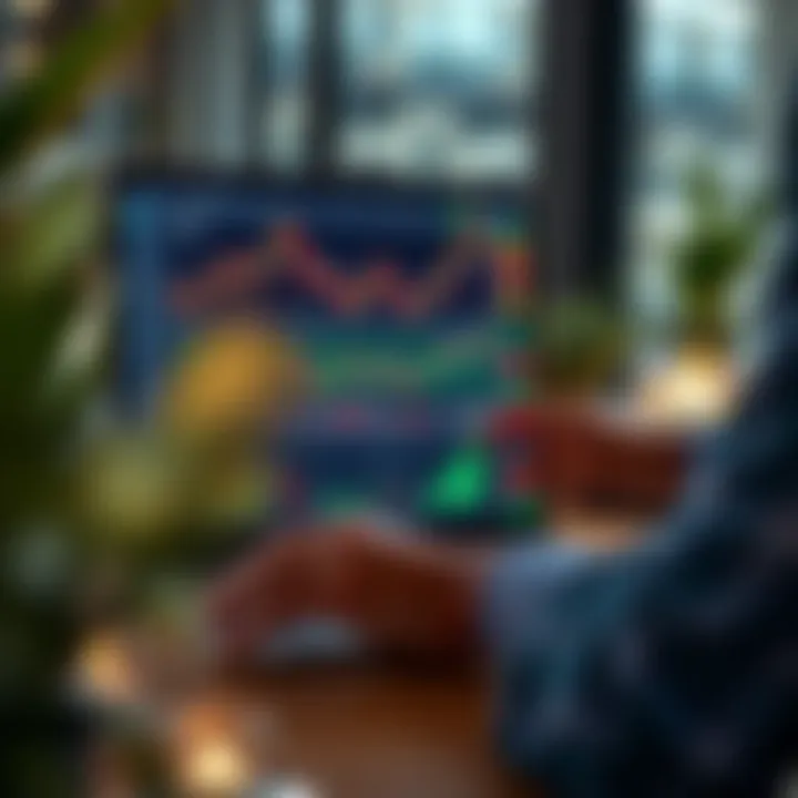 South African investor using a laptop to access an online brokerage platform with financial charts and data on screen